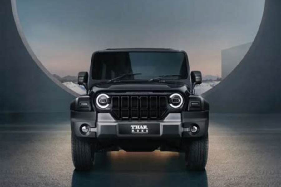 Black Mahindra Thar, a car model available for rental